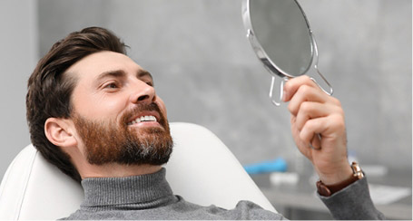 Man Looking at his Teeth in the Mirror 2